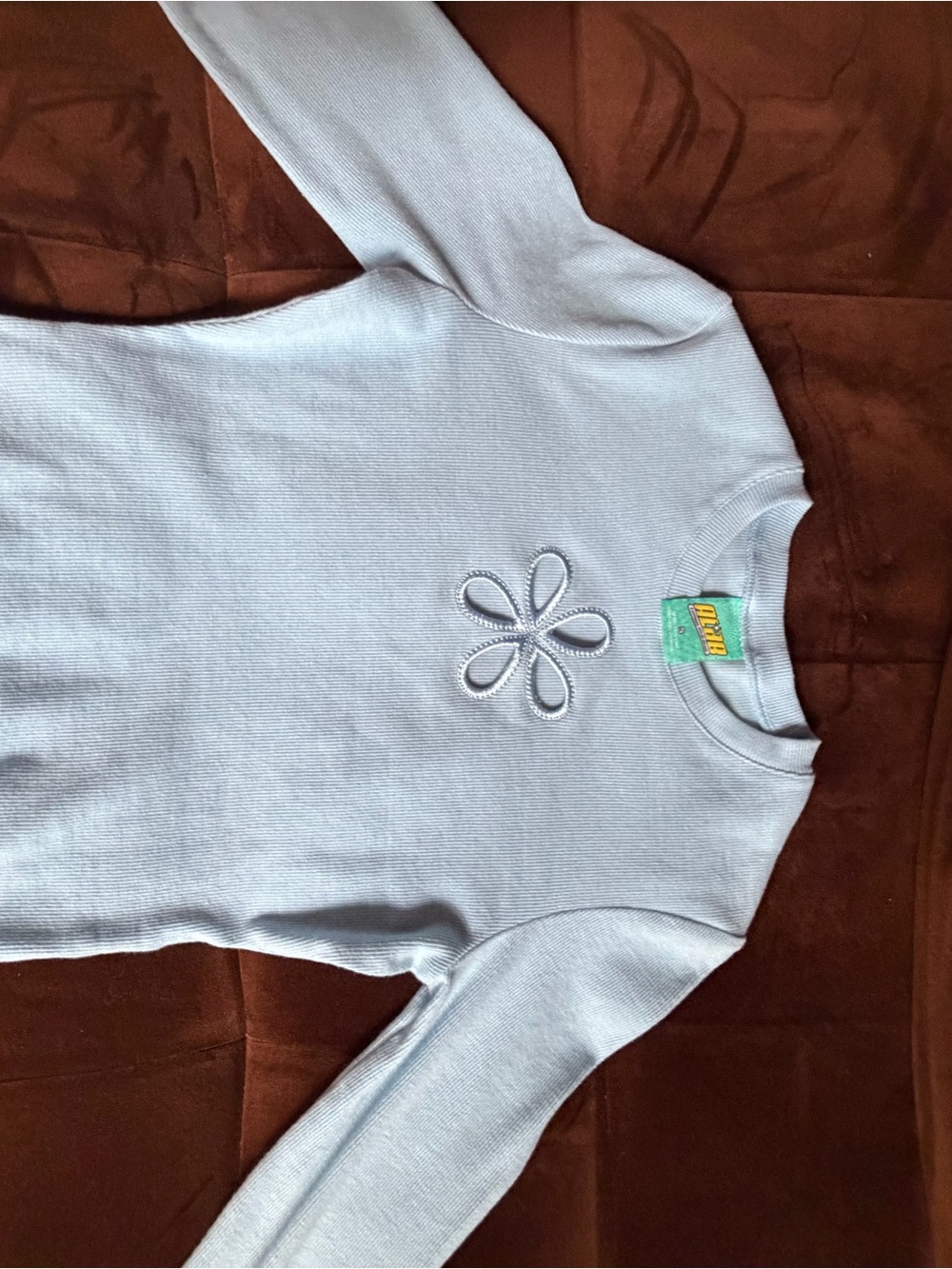 Zumiez Light Blue Long Sleeve Cropped Top with Flower Cutout - Picture 4 of 5